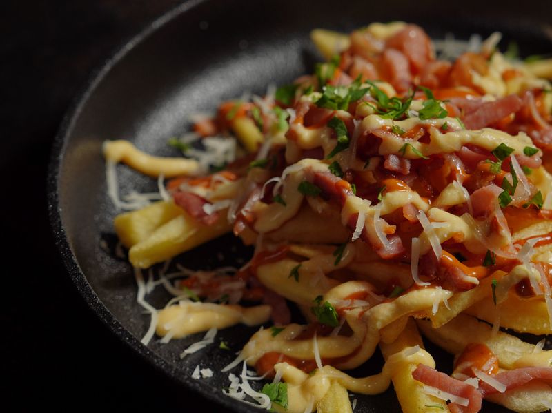 Loaded crispy fries with cheese and toppings